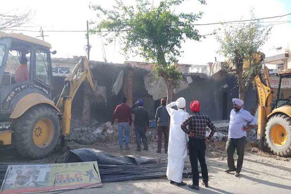 removal of illegal encroachment on lakh paisa panchayat land