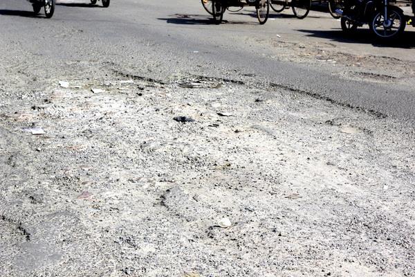 accepted broken roads for the beauty of the city