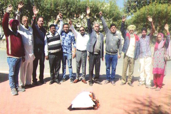 protest by blowing the effigies of central government