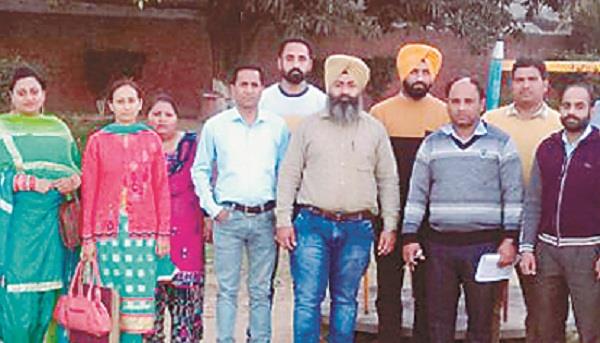 opposition of computer teachers   salary reduction decision