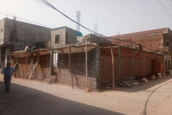 by yes  s  the construction of illegal market near palace begins again