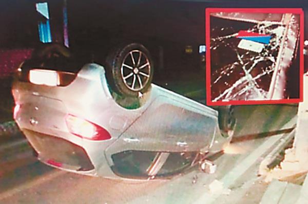 apj in front of the college  the policeman  s car slipped