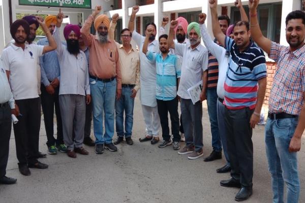 clerical staff from the health department made slogans with black bills
