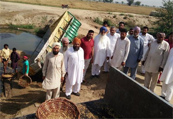 farmer damages with wheel laden trolleys