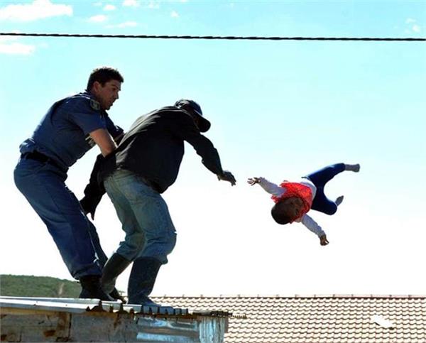 father throws his six month old daughter off his roof
