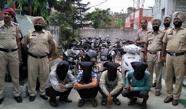 four members of chor gang control with two wheeler