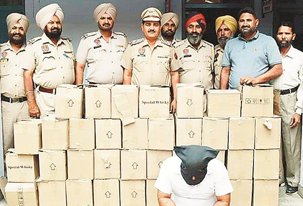 bottles of liquor during the raid