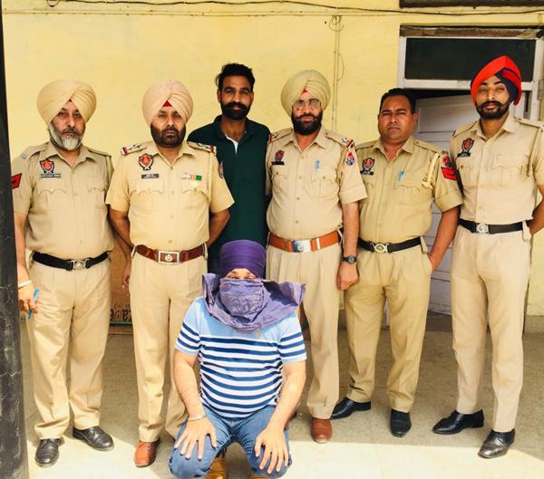 fugitive arrested for looting lakhs of crores