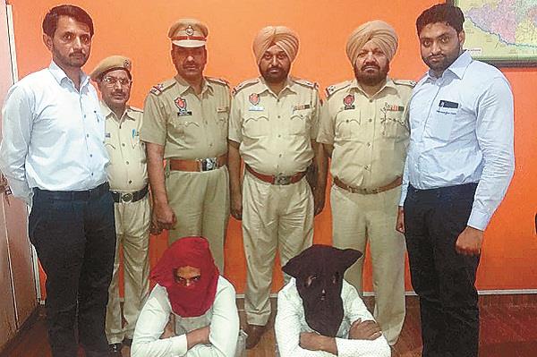 two accused of gang robbery grabbing of donation