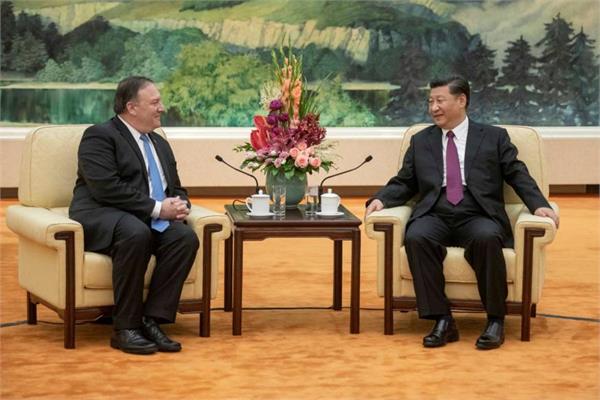 pompeo talks on global peace with chinese president shi