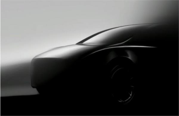 tesla teases  y compact suv again