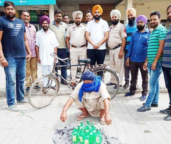 illicit alcohal arrested