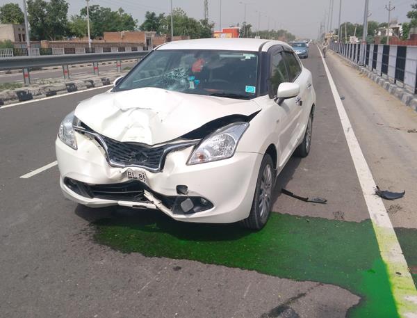 injured motorcycle collided with a car collision