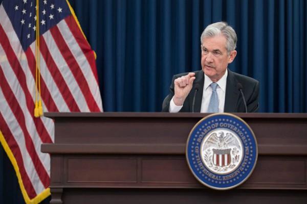 the federal reserve bank promotes interest rates