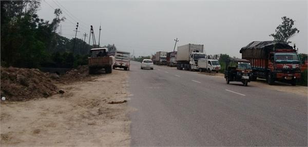 fear accident heavy vehicles standing on the highway side