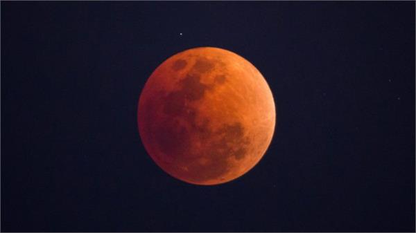longest total lunar eclipse of the century to turn the moon red this month