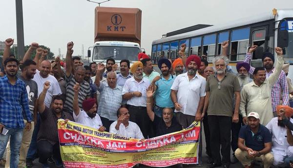 transport unions trucks blocking the highway
