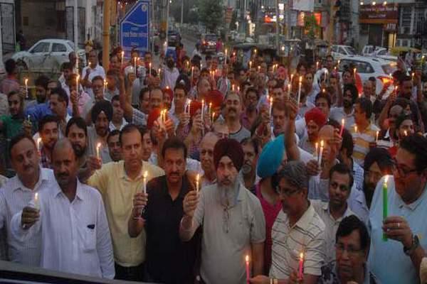 medicine vendors candle march