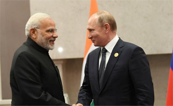 pm modi meets russian president putin at brics summit in africa
