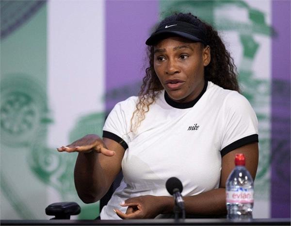serena charged with discrimination in favor of helmet hat