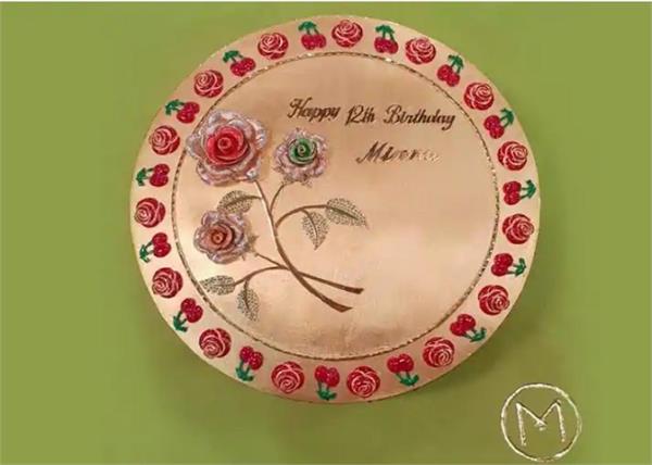 dubai girl donates gold cake for kerala flood relief