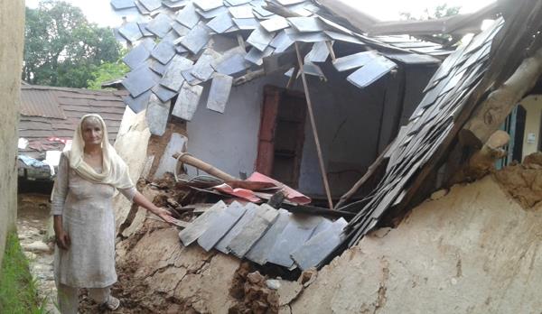 rain damaged the roof of the poor house