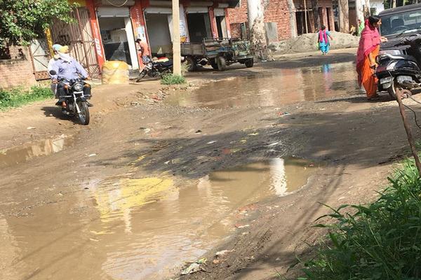 street dilapidated condition people worried