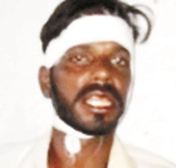 head of the inspector prisoner after reporting the mobile phones