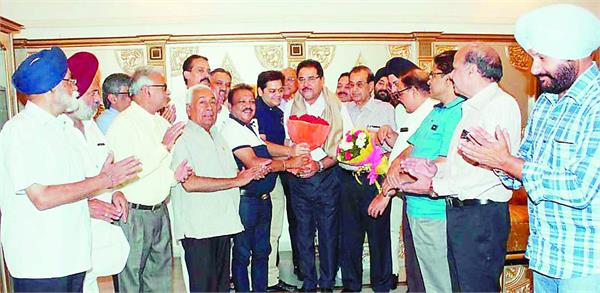 amritsar  businessmen  education minister