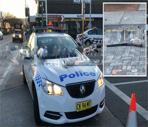 police shoot man armed with shotgun