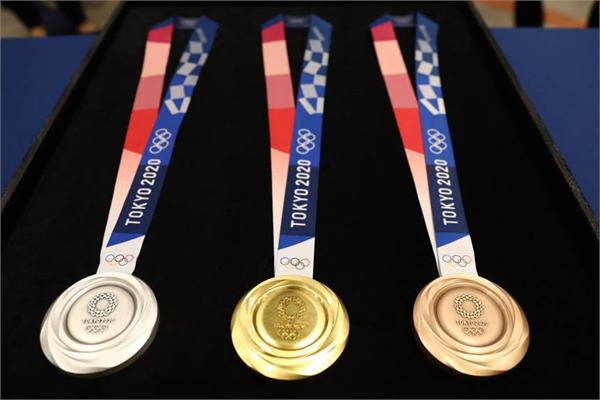 tokyo olympics medal with e waste of smartphones   laptops