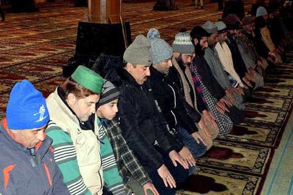 people offer prayers in historic jamia masjid