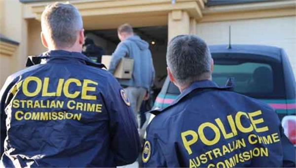 australian police search homes