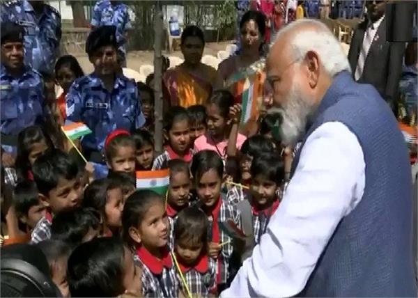 narendra modi interacts with children in gujarat