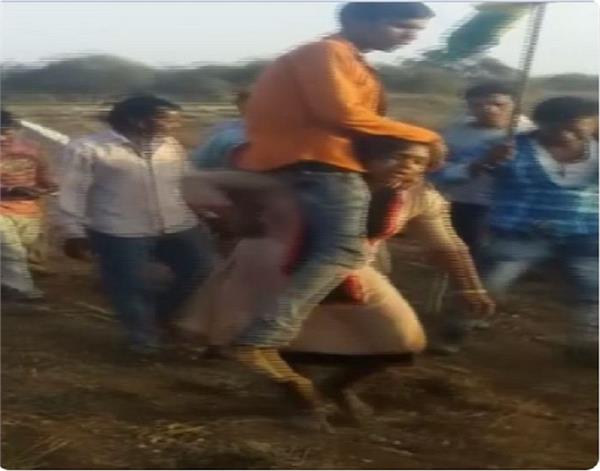 villagers force woman punishment