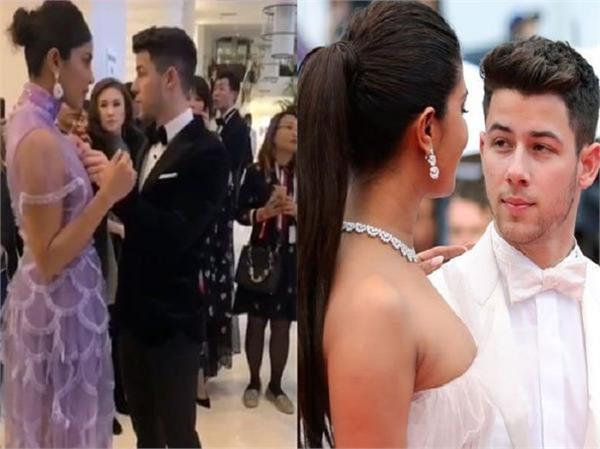 nick jonas fixed wife priyanka chopras dress at event video