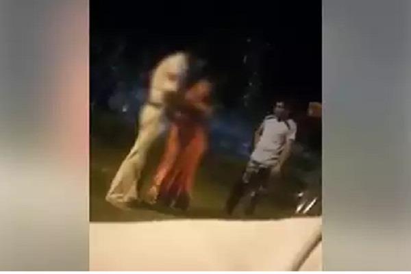 policemen suspended women beaten