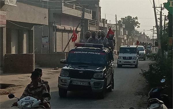 police flag march to keep peace after killing dera premi