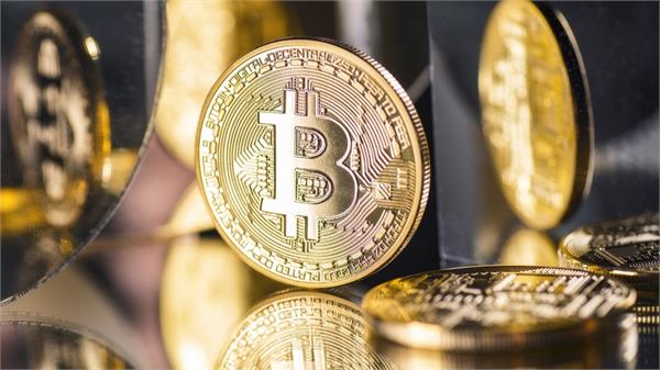 bitcoin breaches  10000 for the first time in 15 months