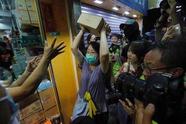 clashes hong kong chinese traders