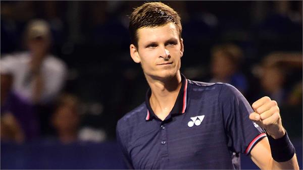 hurkacz downs paire to win first atp title