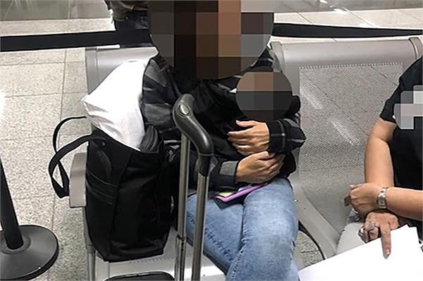 woman arrested for carrying newborn baby in bag