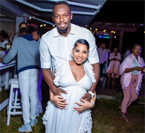 bolt confirms he  s having a baby girl with long term partner kasi bennett