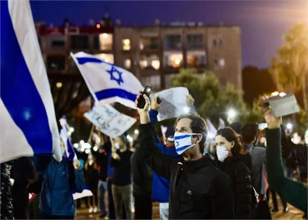 thousands protest in israel against coalition