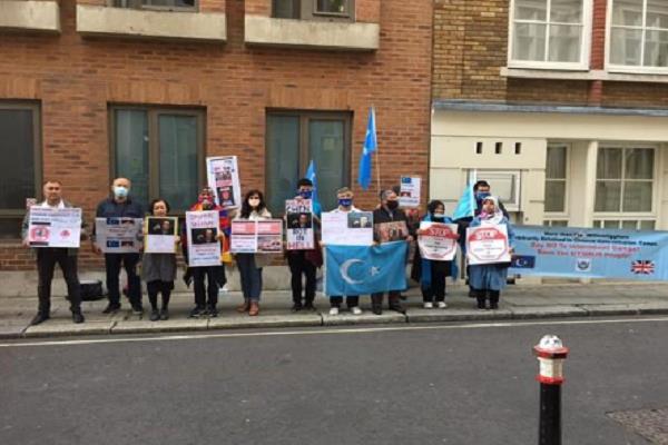 tibetan and uyghur communities in britain protest against china