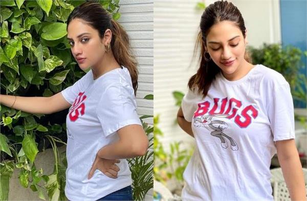 photos shared by nusrat jahan in white t shirt and dennis jeans
