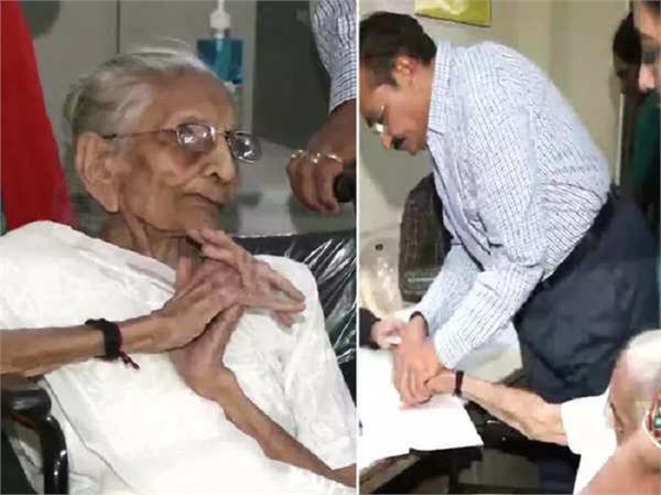 gujarat election prime minister modi s mother heeraben casts her vote
