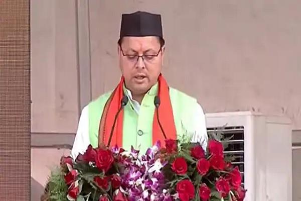pushkar singh dhami takes oath as chief minister