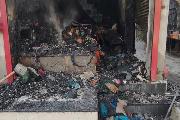 a clothing shop was set on fire by pouring petrol