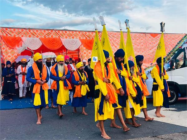 nagar kirtan organized in the city of faudi  italy